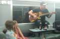1550_Singing_in_the_train